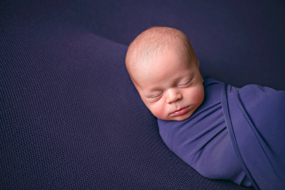 Baby boy in blue, newborn photographer Ireland