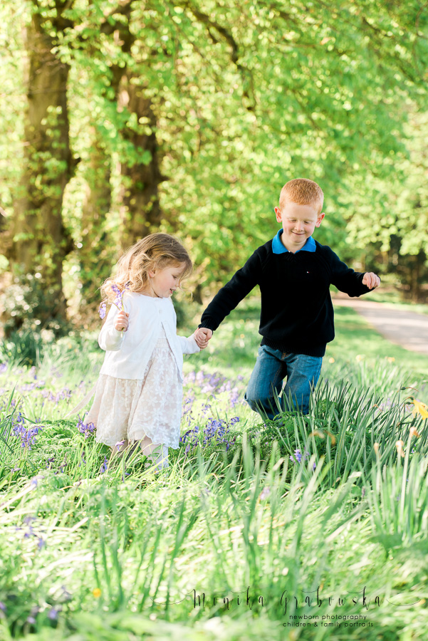 children photographed in a field ful of bluebells in Clonmel by Tipperary photographer Monika Grabowska